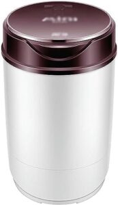 Mini washing machine in a small space, highlighting its compact design and semi-automatic functionality