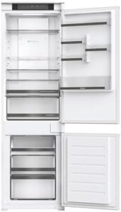 Haier HBW5518EK-1 Integrated Total No Frost Fridge Freezer in white, showing sleek and modern design with ample storage capacity